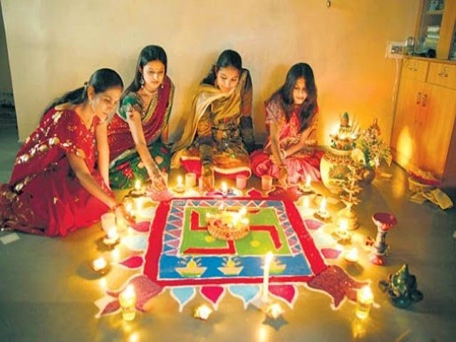 Women Making Rangoli for Diwali.jpg