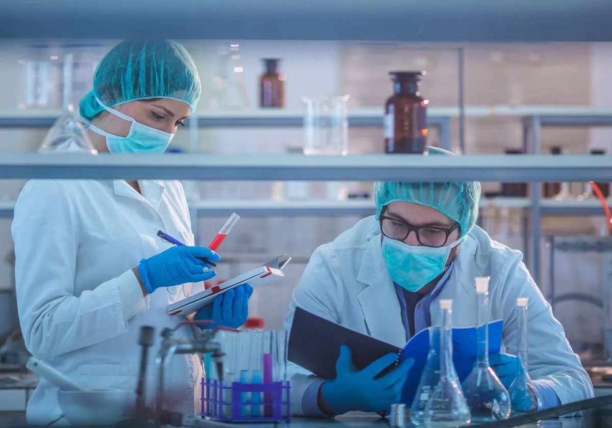 Scientists At Work In The Lab L