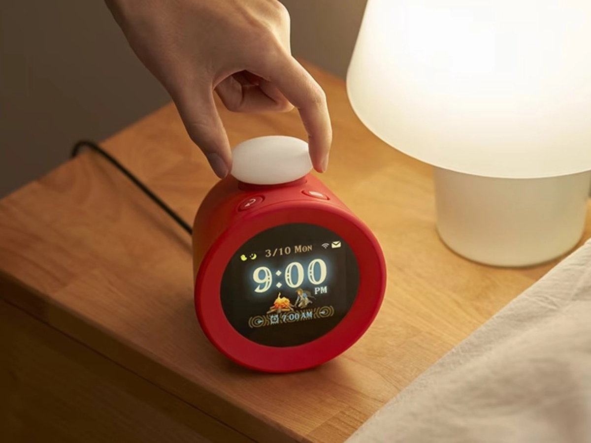 Nintendo interactive alarm clock alarmo on a bedside table.jpeg